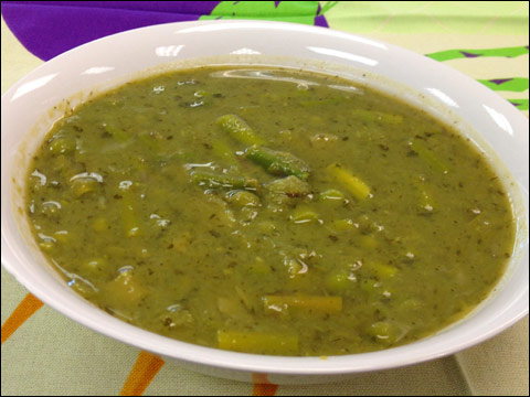 springtime fresh pea asparagus soup in bowl