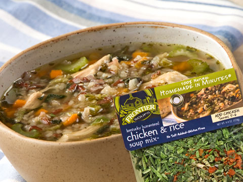 chicken and rice soup in brown bowl