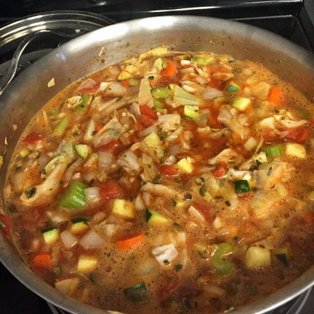 cabbage soup simmering in pot