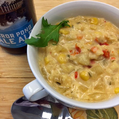 cheddar beer and corn soup in bowl