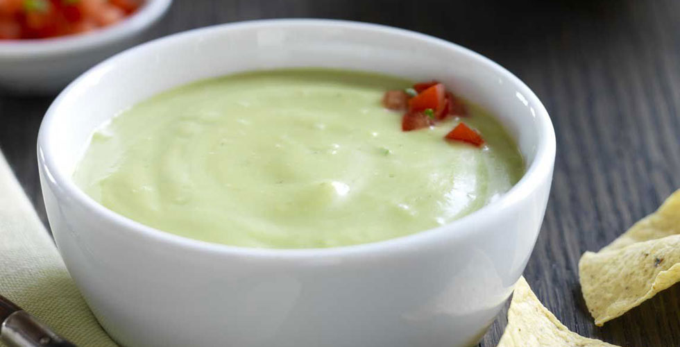 avacado soup in white bowl